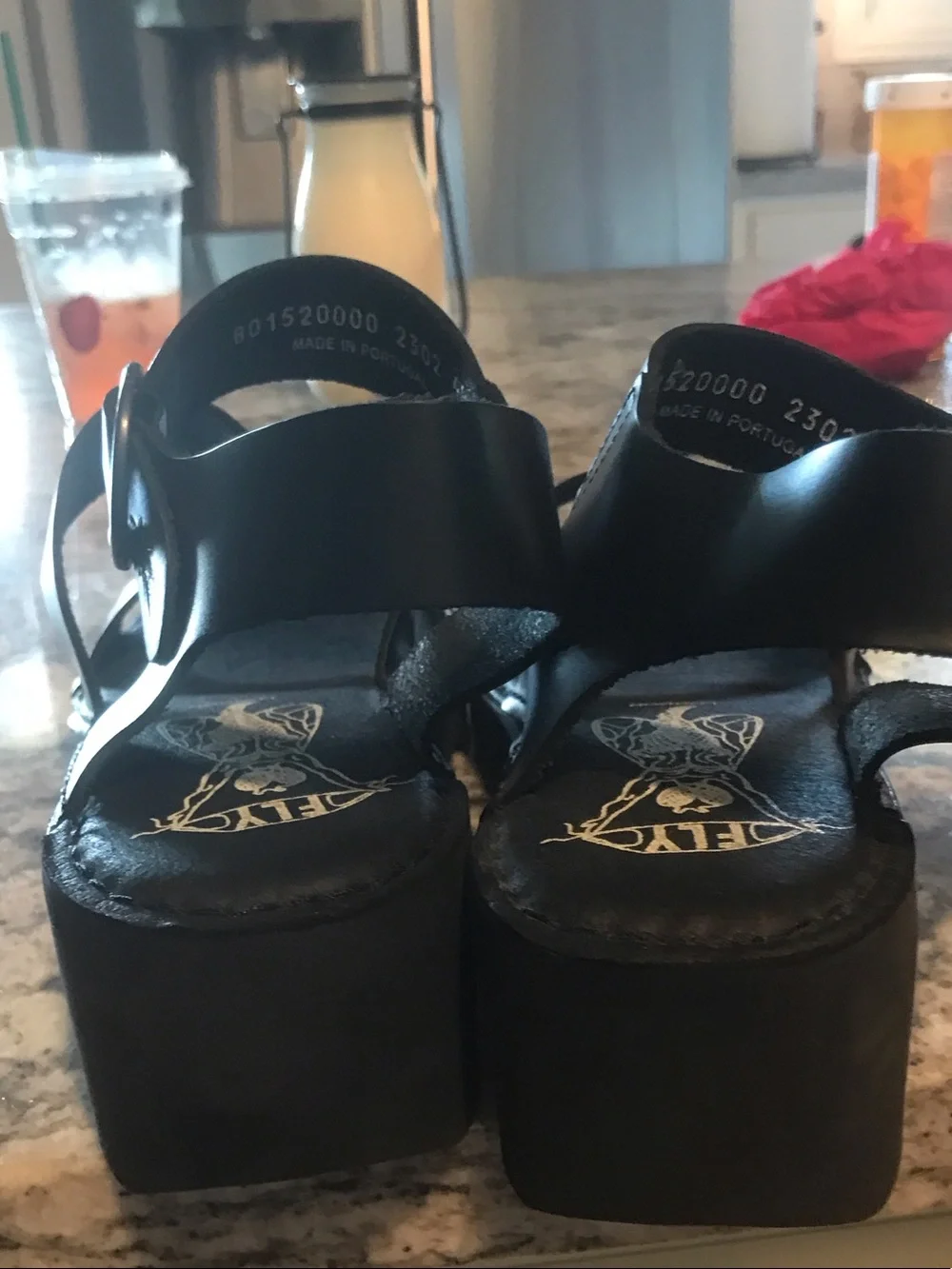 Fly London Black Leather Wedge Sandals